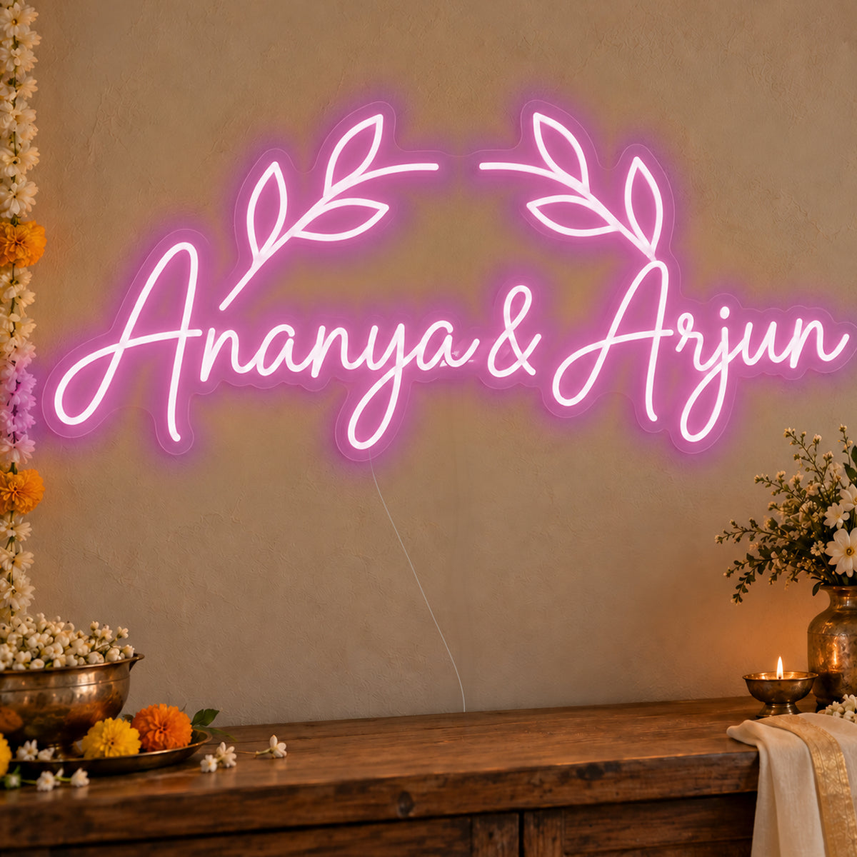 Personalised Floral Arch Names Neon Sign in pink LED neon on clear acrylic, angled view