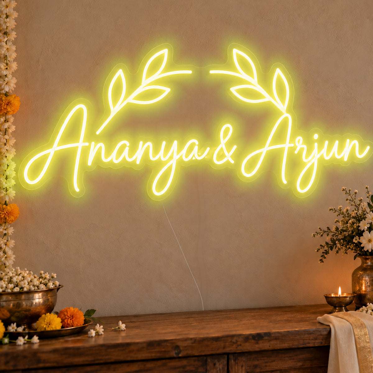 Personalised Floral Arch Names Neon Sign in yellow LED neon on clear acrylic, angled view