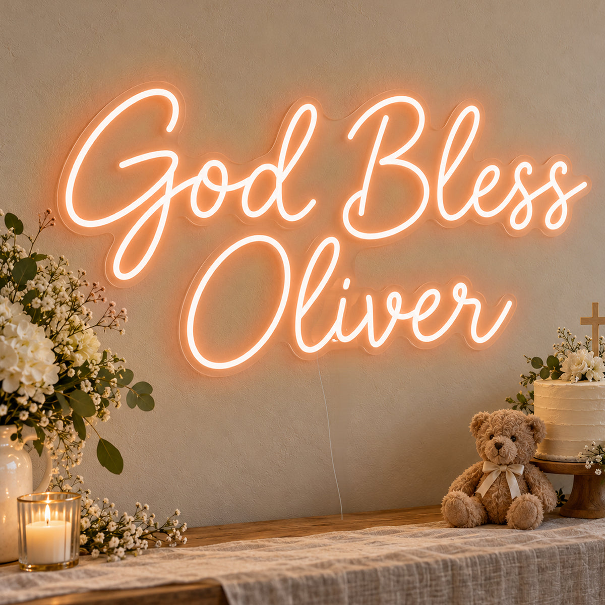 Personalised God Bless Neon Sign in orange LED neon on clear acrylic, angled view