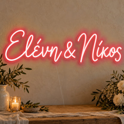Personalised Greek Couple Names Neon Sign in red LED neon on clear acrylic, angled view