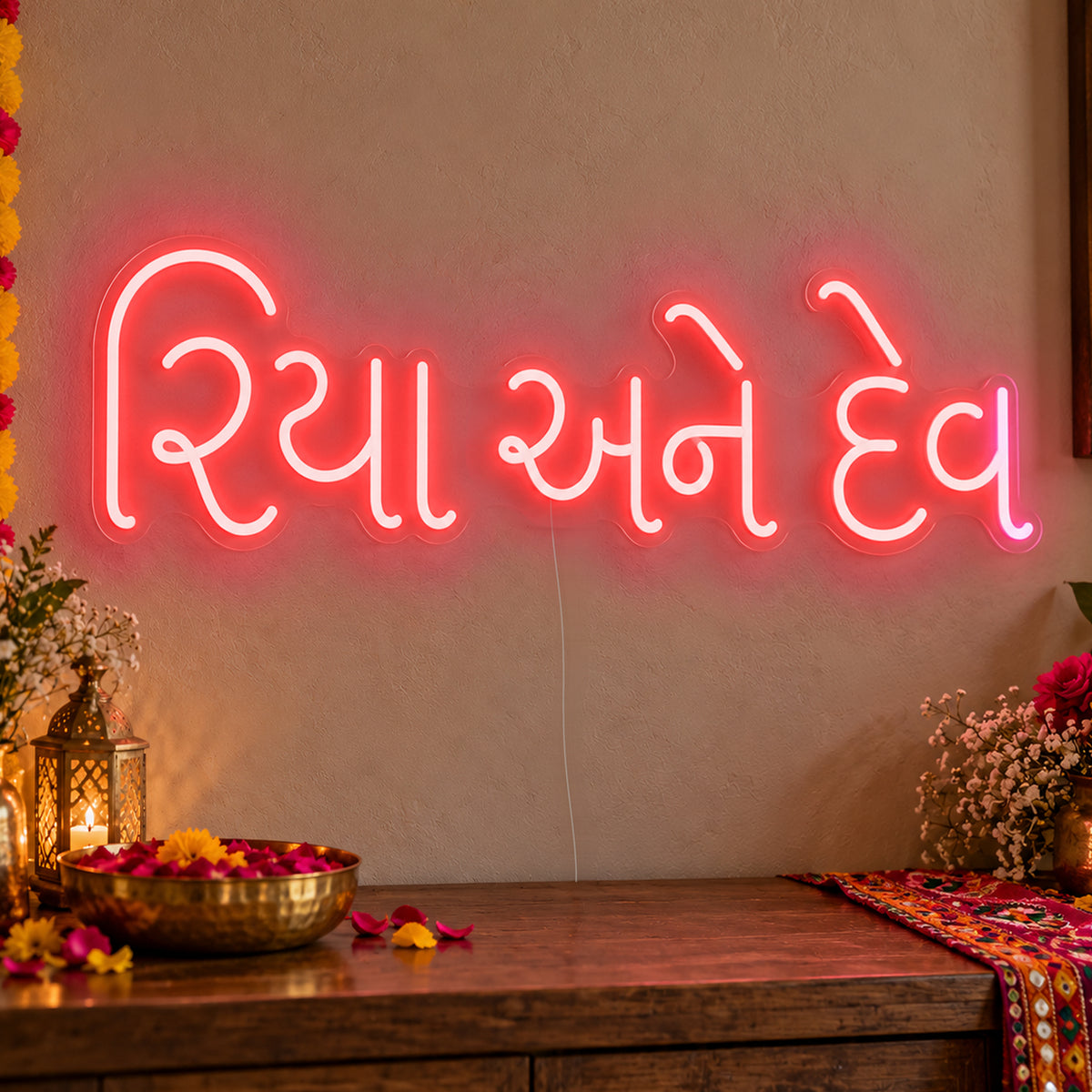 Personalised Gujarati Couple Names Neon Sign in red LED neon on clear acrylic, angled view
