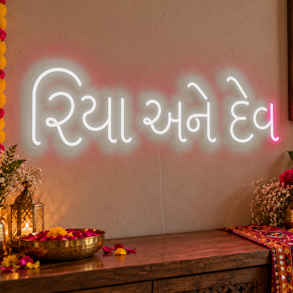 Personalised Gujarati Couple Names Neon Sign in white LED neon on clear acrylic, angled view