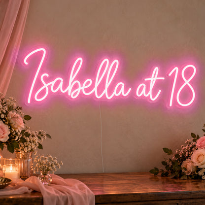 Personalised Name At 18 Neon Sign in rose red LED neon on clear acrylic, angled view