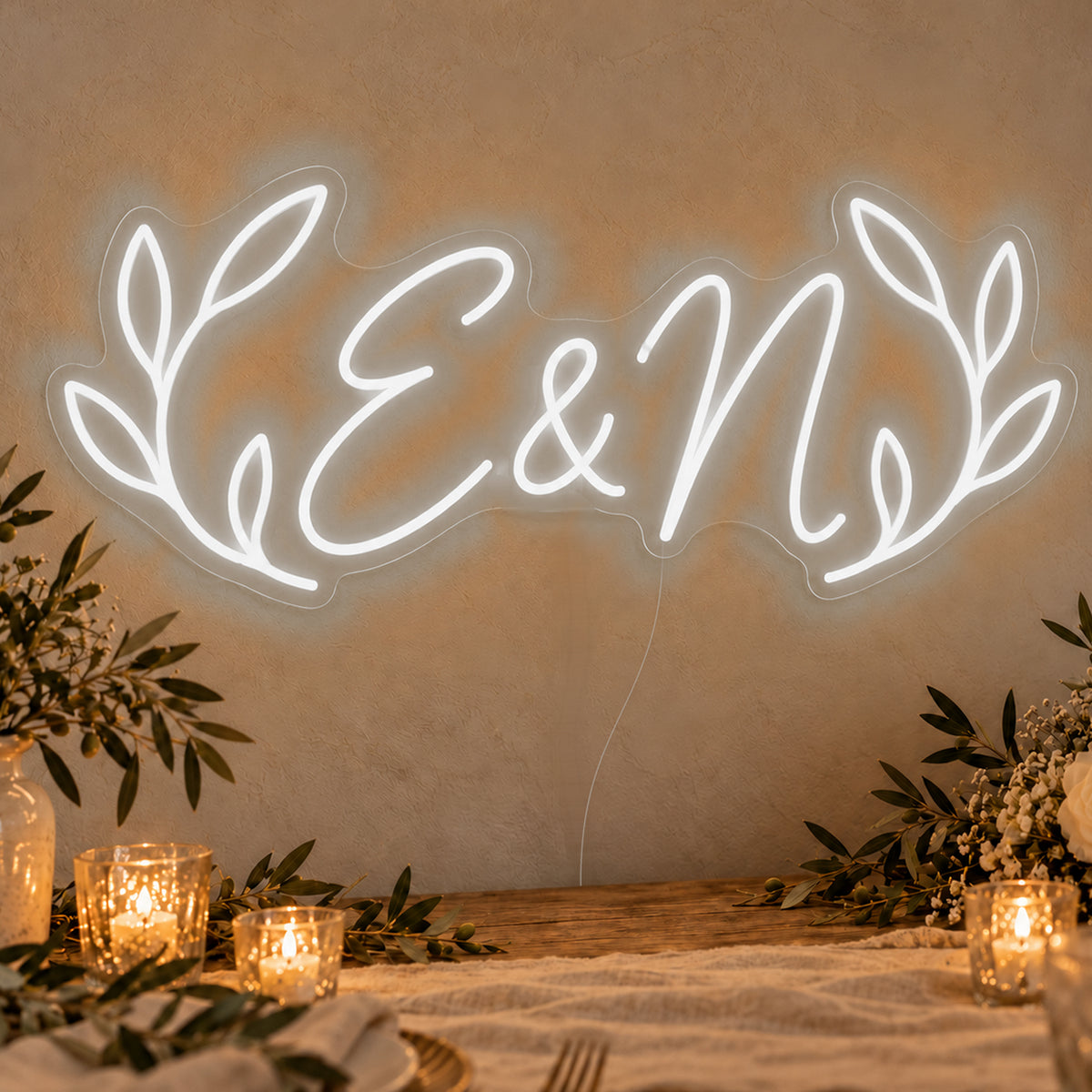 Personalised Olive Initials Neon Sign in white LED neon on clear acrylic, angled view
