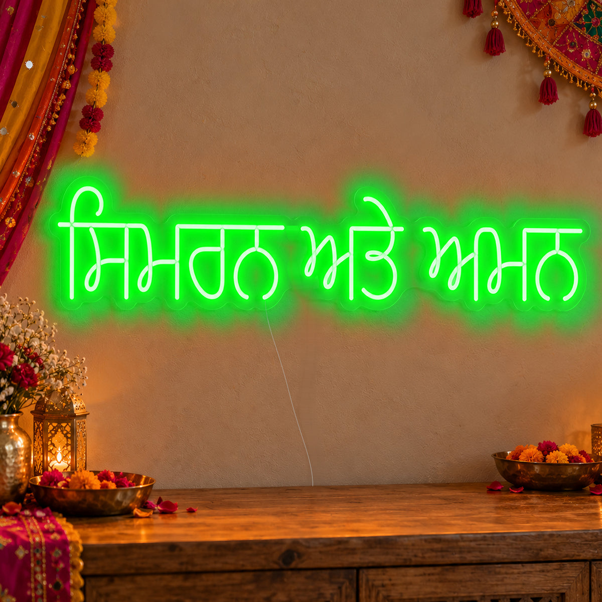Personalised Punjabi Couple Names Neon Sign in green LED neon on clear acrylic, angled view