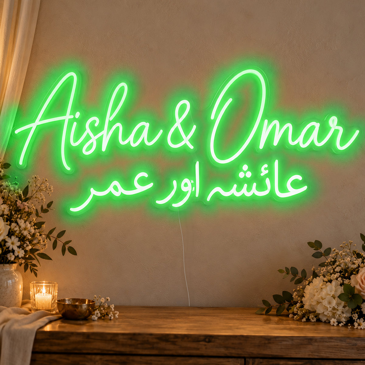 Personalised Two Script Names Neon Sign in green LED neon on clear acrylic, angled view