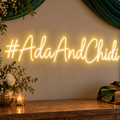 Personalised Wedding Hashtag Neon Sign in gold LED neon on clear acrylic, angled view