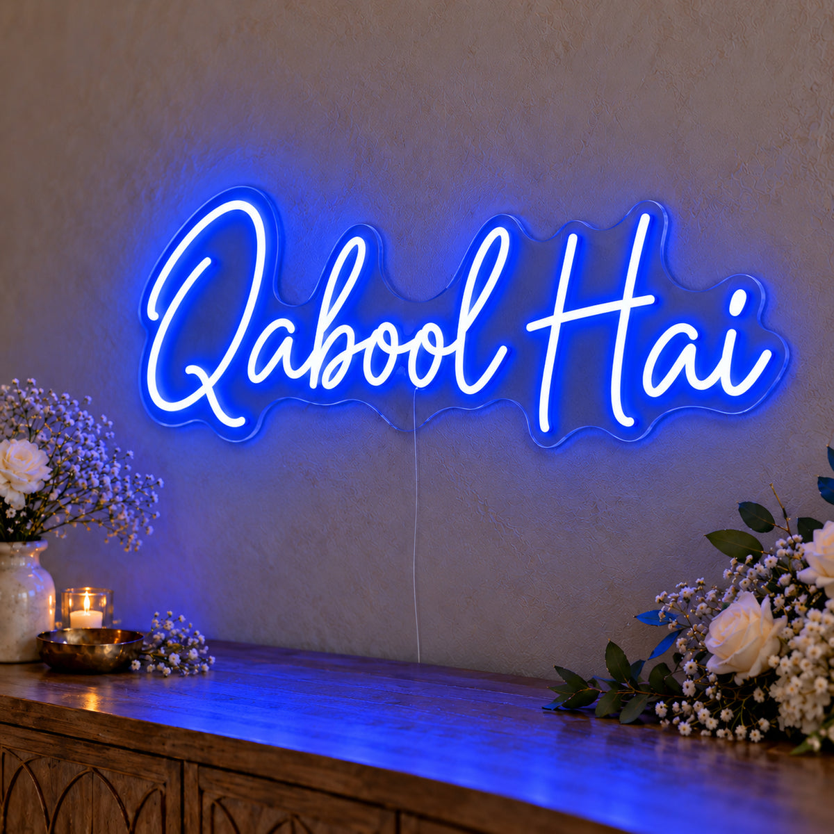 Qabool Hai Neon Sign in blue LED neon on clear acrylic, angled view