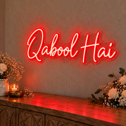 Qabool Hai Neon Sign in red LED neon on clear acrylic, angled view