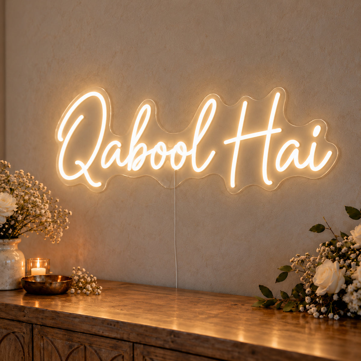 Qabool Hai Neon Sign in warm white LED neon on clear acrylic, angled view