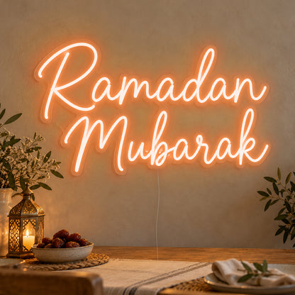 Ramadan Mubarak Neon Sign in orange LED neon on clear acrylic, angled view