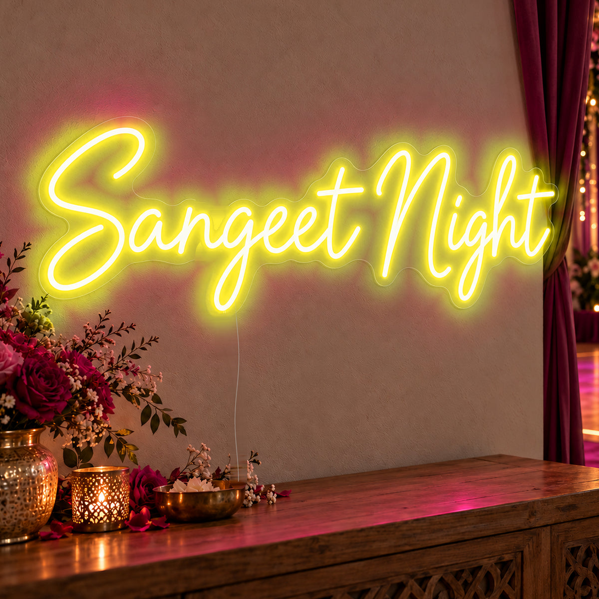 Sangeet Night Neon Sign in yellow LED neon on clear acrylic, angled view