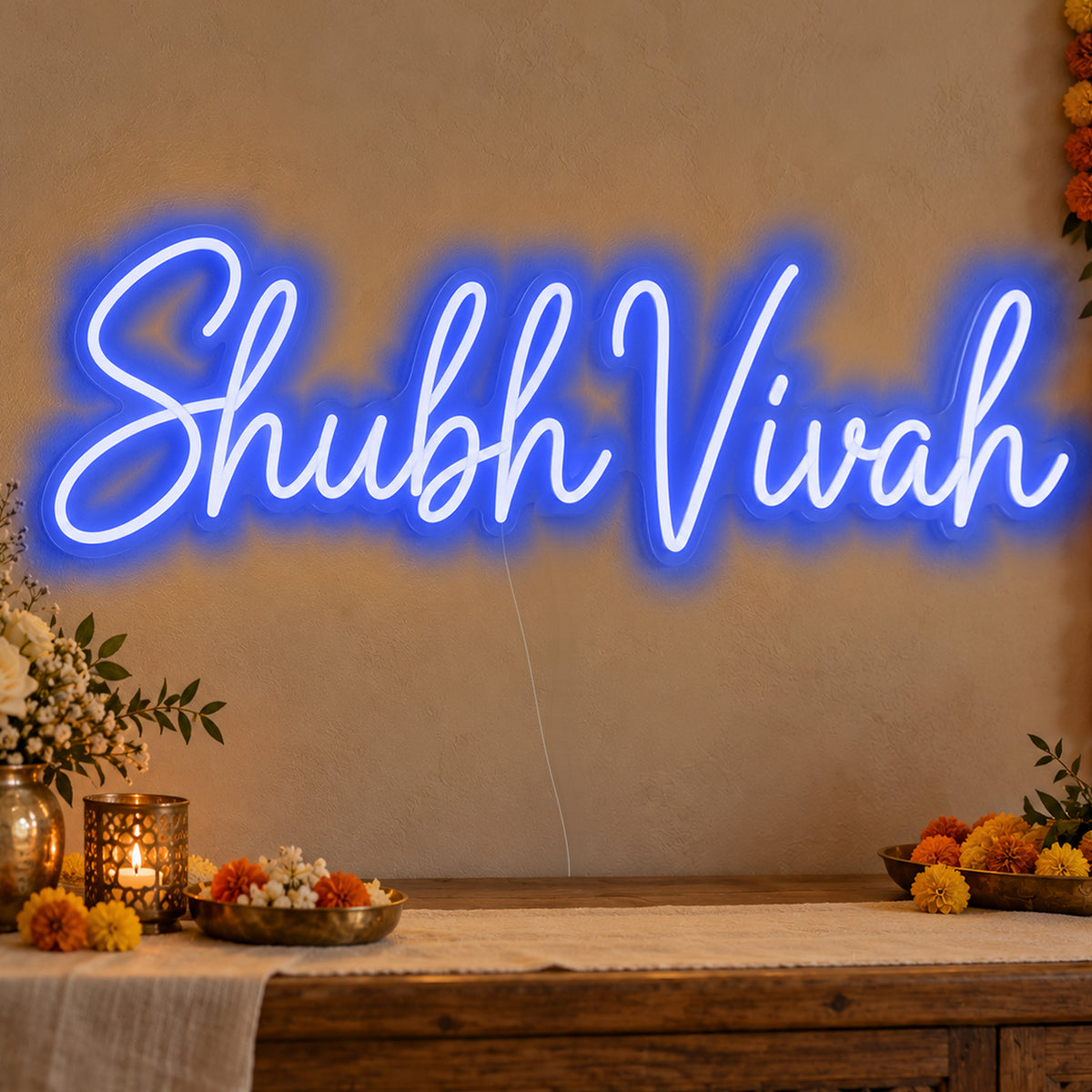 Shubh Vivah Neon Sign in blue LED neon on clear acrylic, angled view