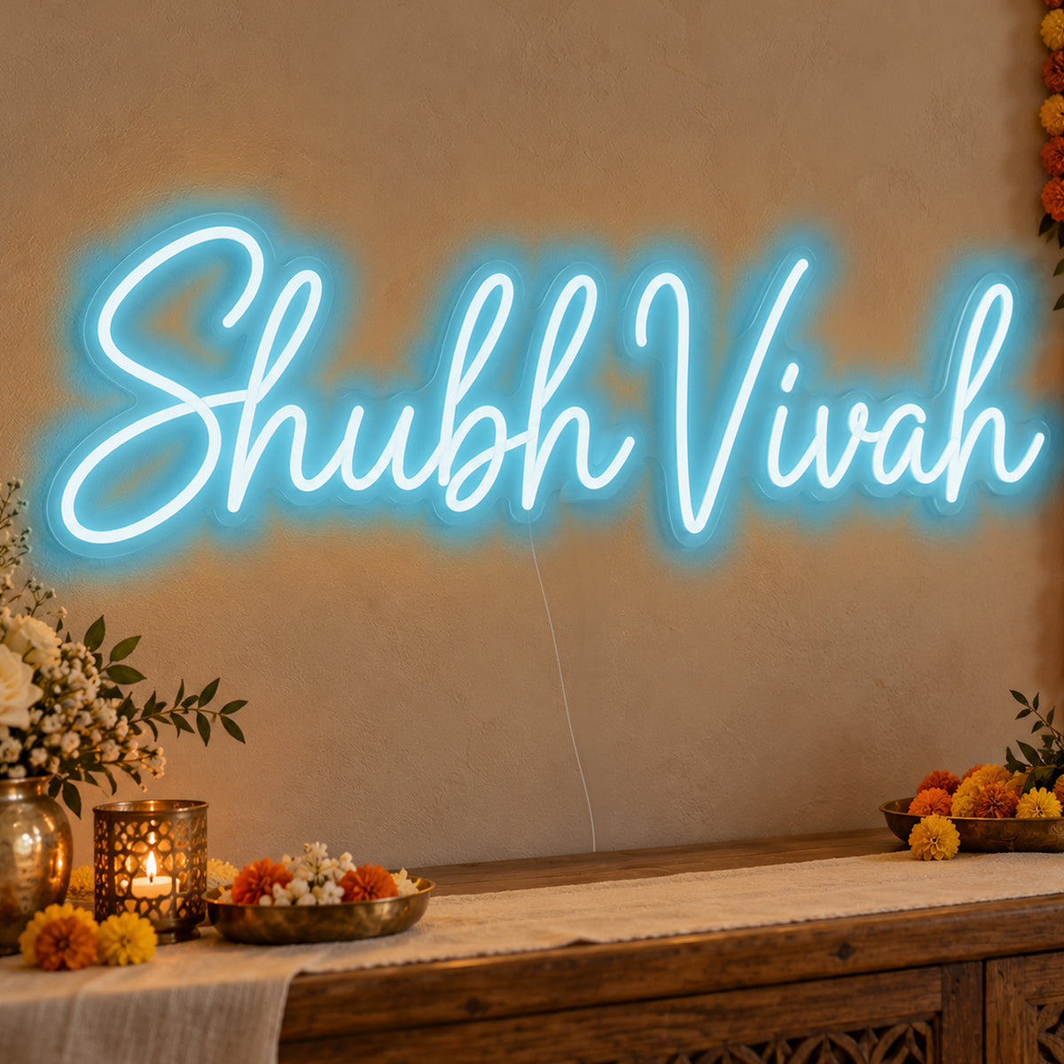 Shubh Vivah Neon Sign in ice blue LED neon on clear acrylic, angled view