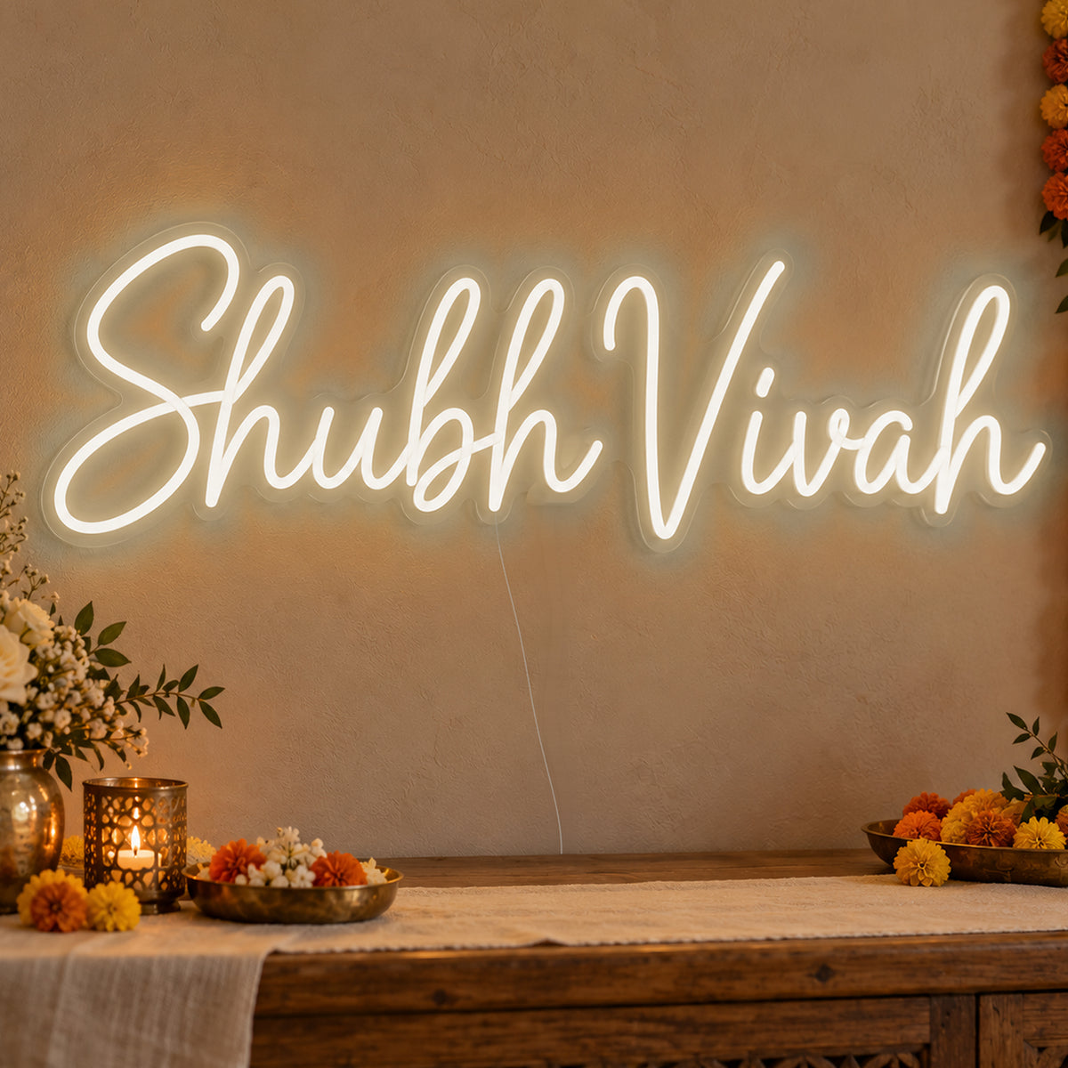 Shubh Vivah Neon Sign in warm white LED neon on clear acrylic, angled view