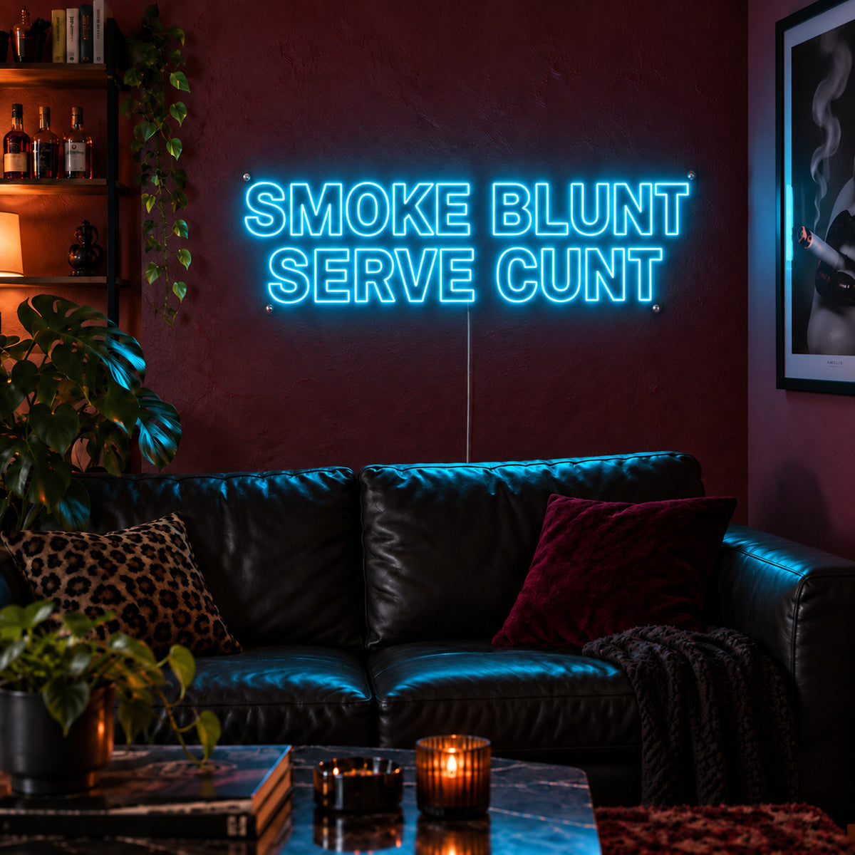 Ice Blue version of the Smoke Blunt Serve Cunt Neon Sign, shown above a black leather sofa.