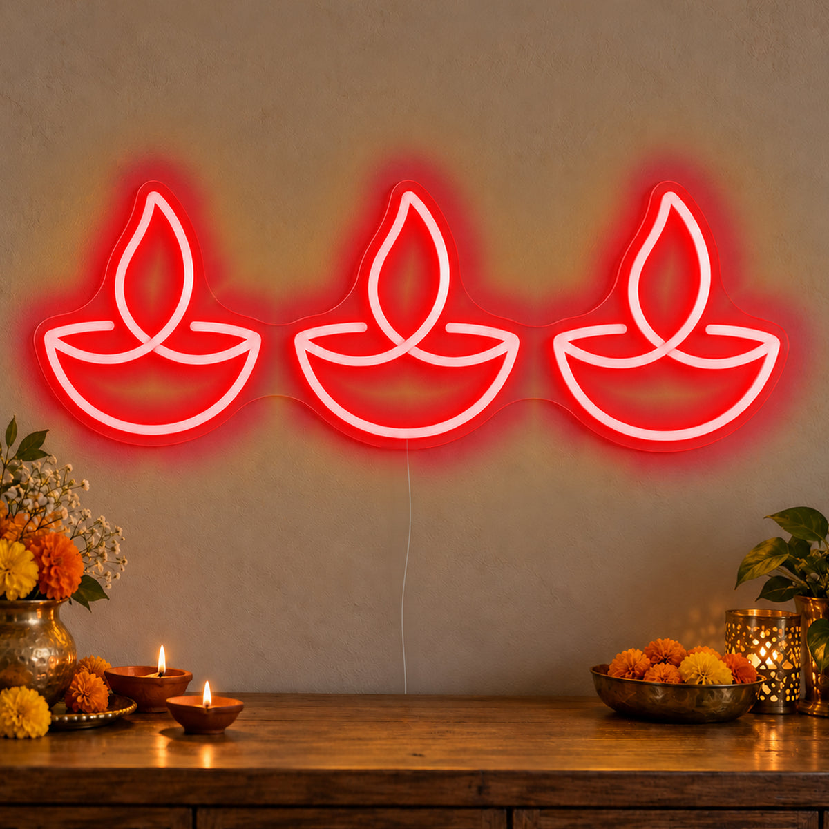 Three Diyas Neon Sign in red LED neon on clear acrylic, angled view