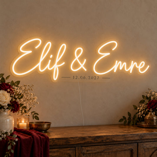 Personalised Turkish Names Date Neon Sign on clear cut-to-shape acrylic in an illuminated wall display; example personalisation shown.