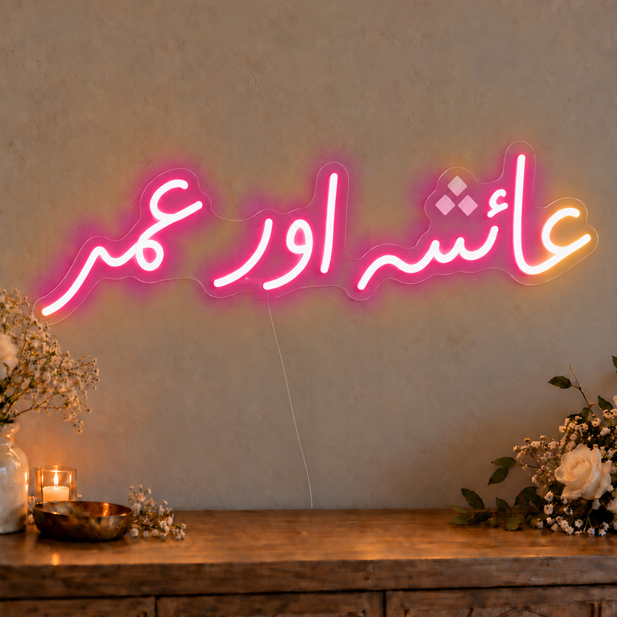Personalised Urdu Couple Names Neon Sign in rose red LED neon on clear acrylic, angled view