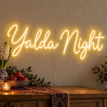 Yalda Night Neon Sign in gold LED neon on clear acrylic, angled view