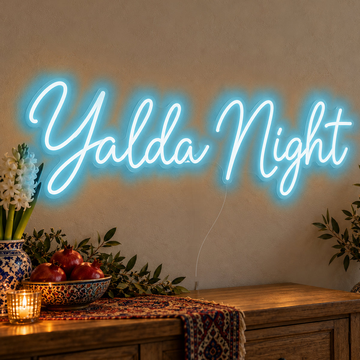 Yalda Night Neon Sign in ice blue LED neon on clear acrylic, angled view