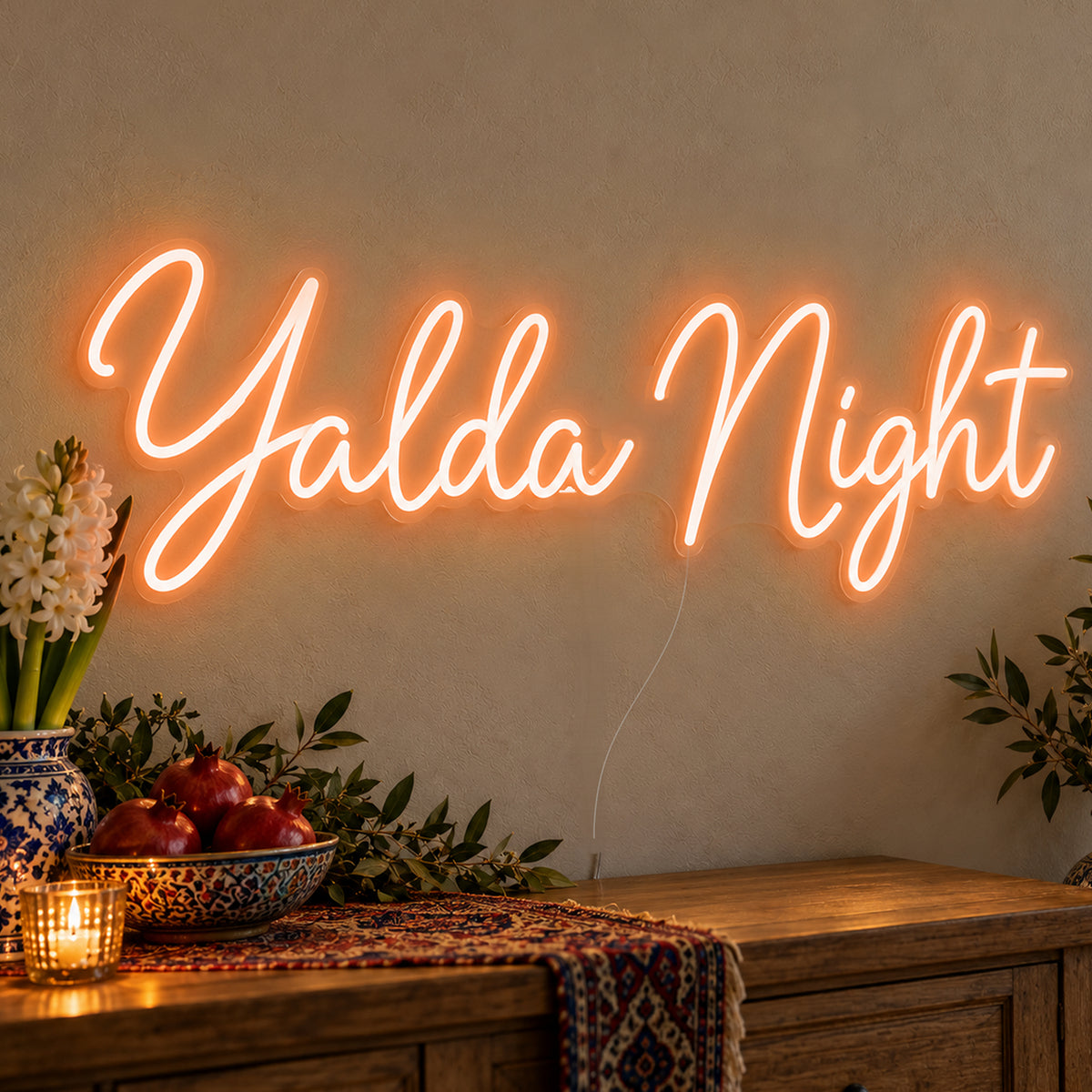 Yalda Night Neon Sign in orange LED neon on clear acrylic, angled view