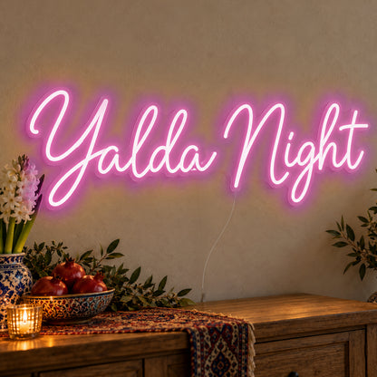 Yalda Night Neon Sign in pink LED neon on clear acrylic, angled view