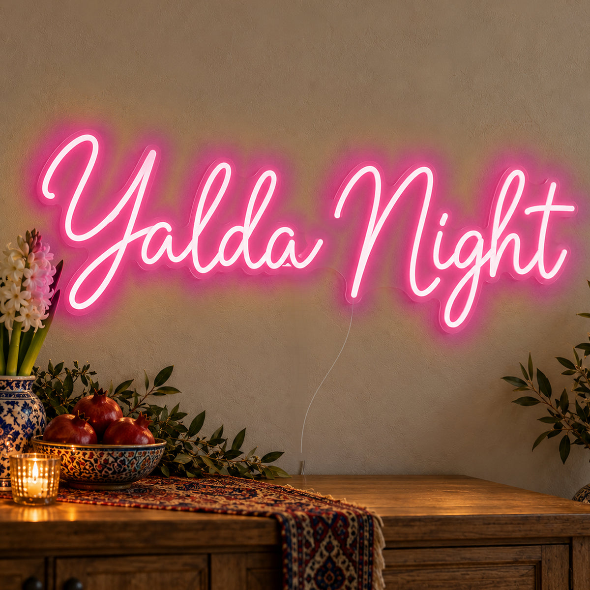 Yalda Night Neon Sign in rose red LED neon on clear acrylic, angled view
