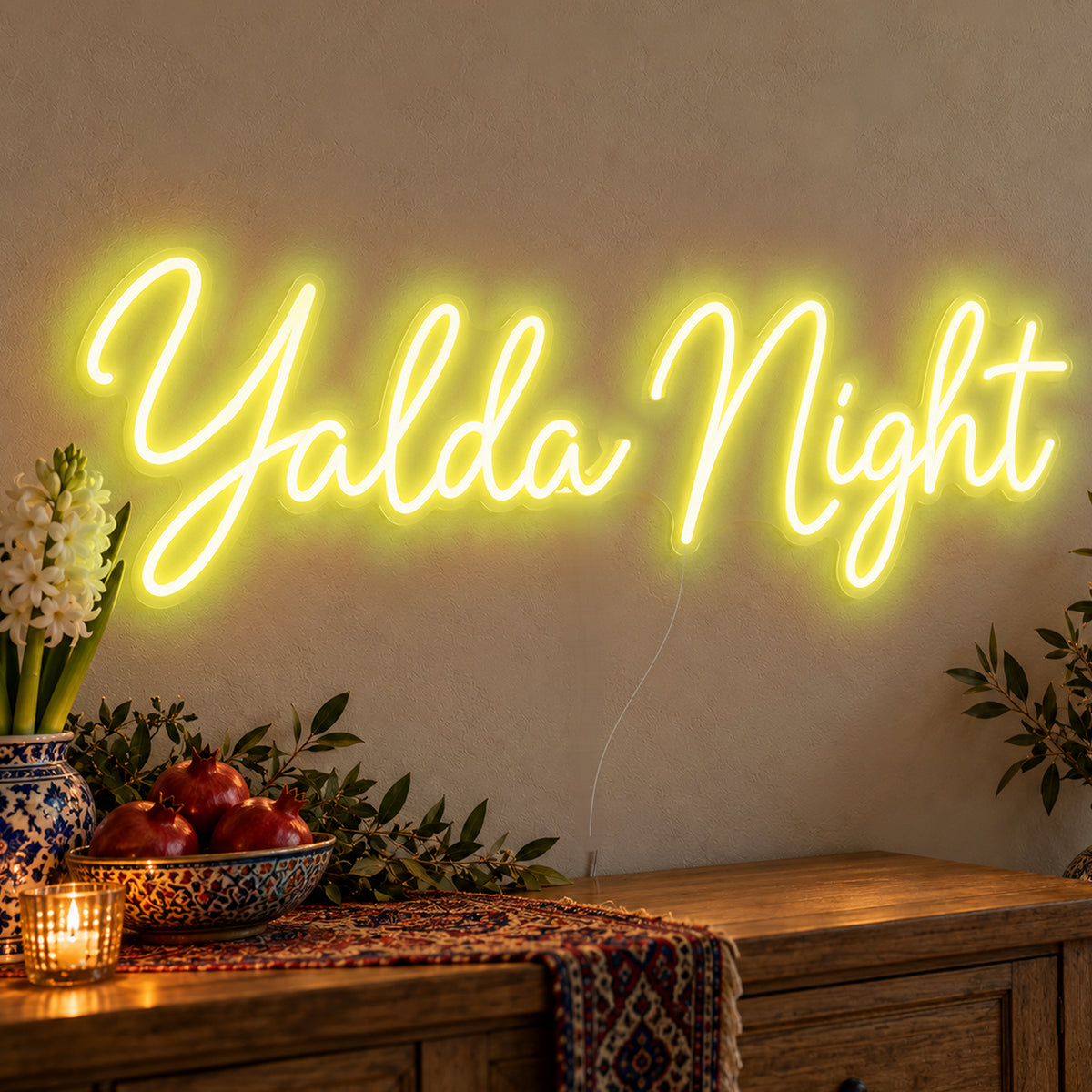 Yalda Night Neon Sign in yellow LED neon on clear acrylic, angled view