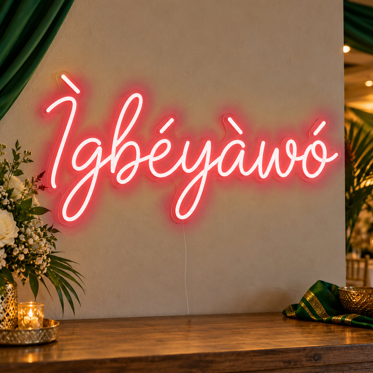Ìgbéyàwó Yoruba Wedding Neon Sign in red LED neon on clear acrylic, angled view